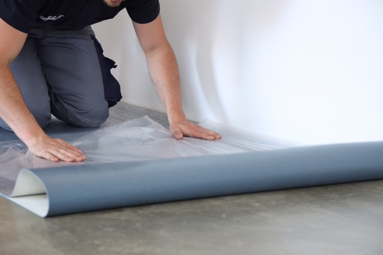 Fold back half of the sheet and peel off the protective film.