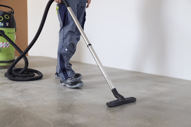 Vacuum thoroughly with an industrial vacuum cleaner.